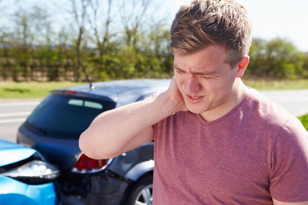 man with neck pain from car accident